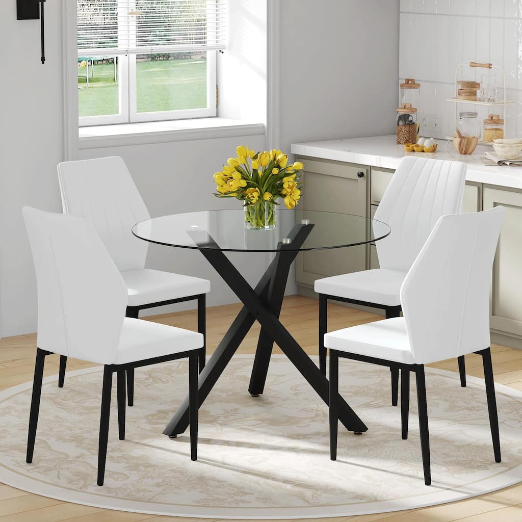 Table and chair set.Modern glass round table: X-shaped black metal bracket. Paired with 4 Dining Chairs