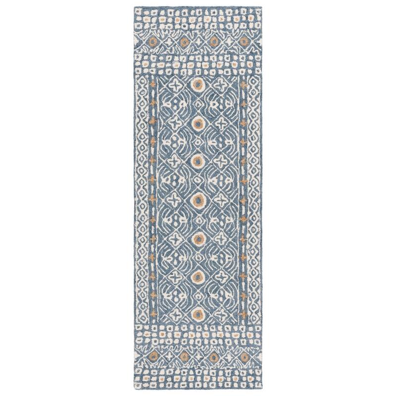 SAFAVIEH Handmade Micro-Loop Reglind Wool Rug
