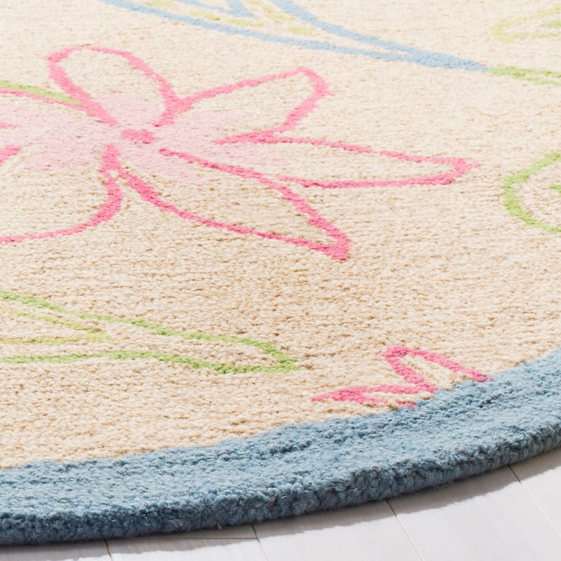 SAFAVIEH Handmade Kids Dayana Floral Wool Rug