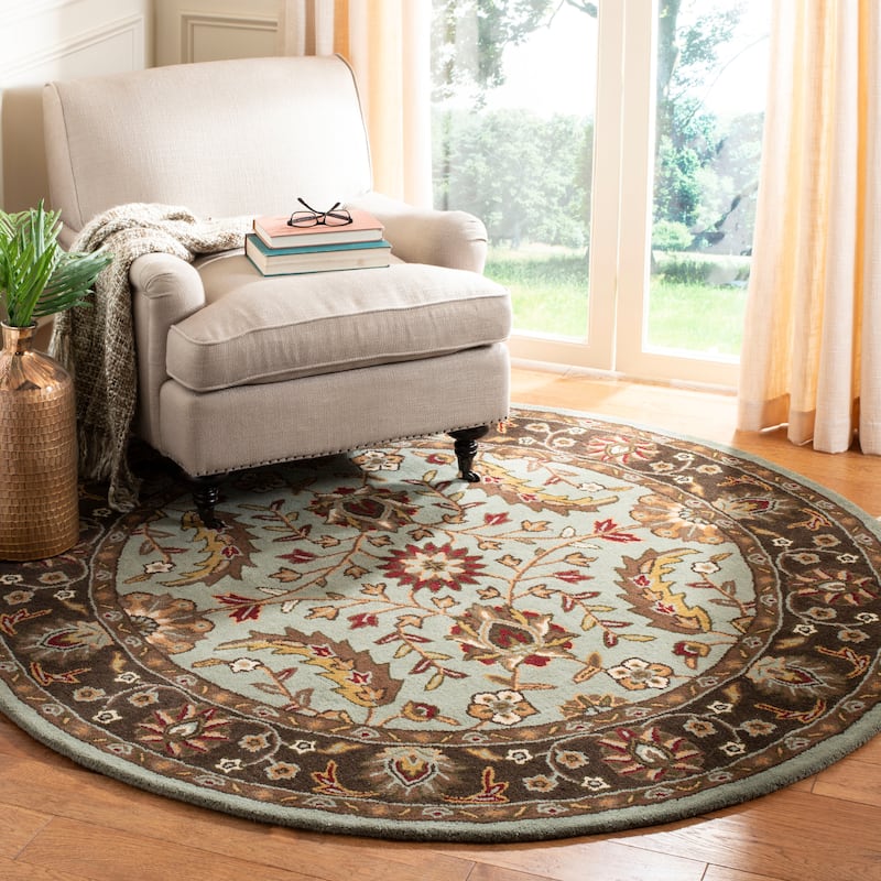 SAFAVIEH Handmade Heritage Owena Traditional Oriental Wool Rug - 6' Round - Blue/Brown