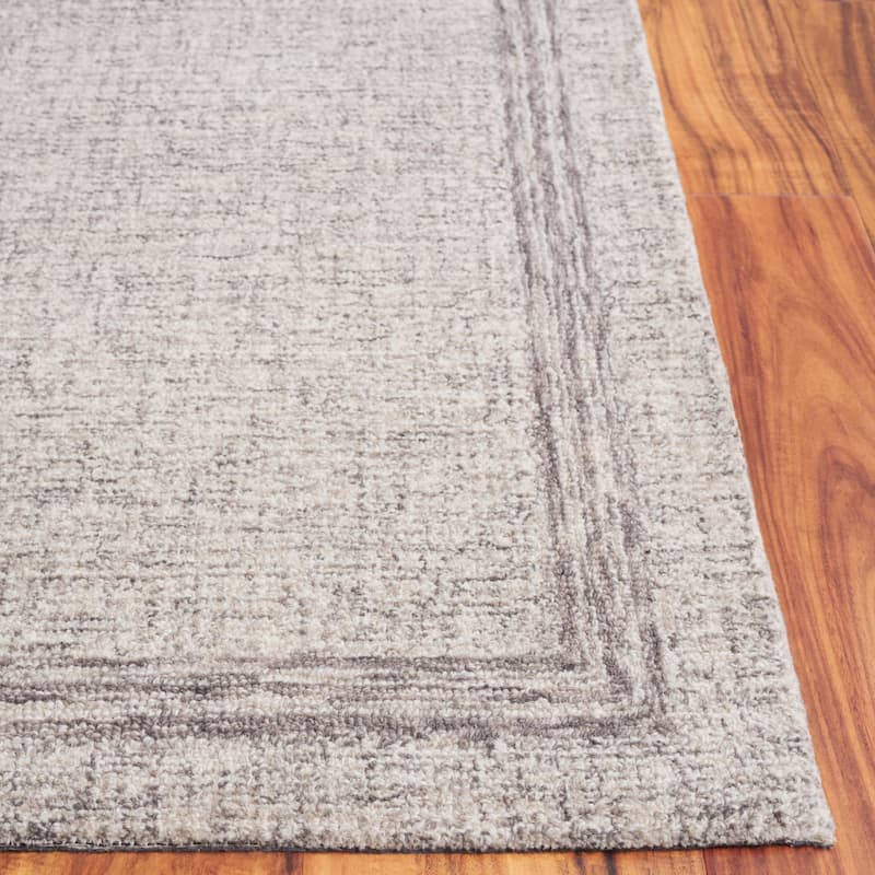 SAFAVIEH Handmade Ebony Sanija Modern & Contemporary Wool Rug