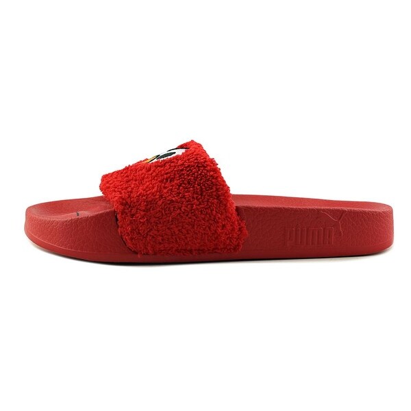 red fur puma slides