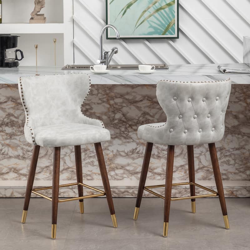 Roundhill Furniture Nevis Mid-century Modern Faux Leather Tufted Nailhead Trim Counter Stool Set of 2