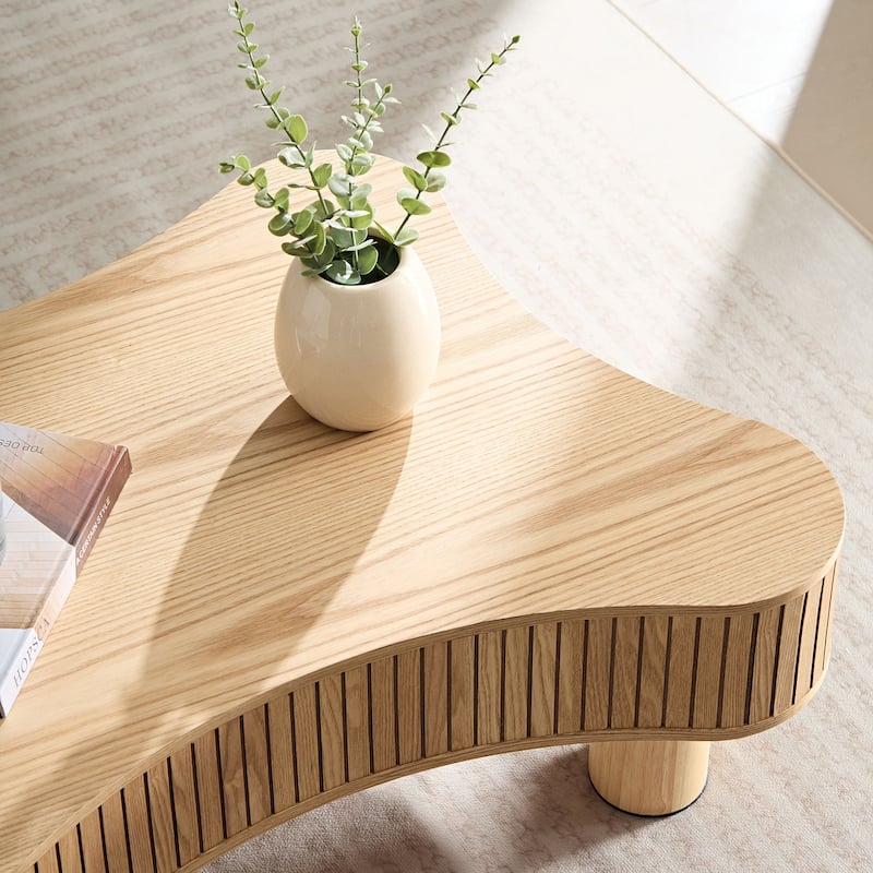 Modern Irregular Shaped Coffee Table Compact Wooden Accent Table with Side Vertical Stripe Fluted Decor and Wood Grain Surface
