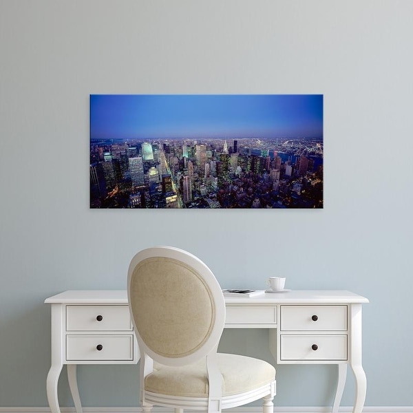 Easy Art Prints Panoramic Images's 'Buildings lit up in a city, New York City, New York, USA' Premium Canvas Art