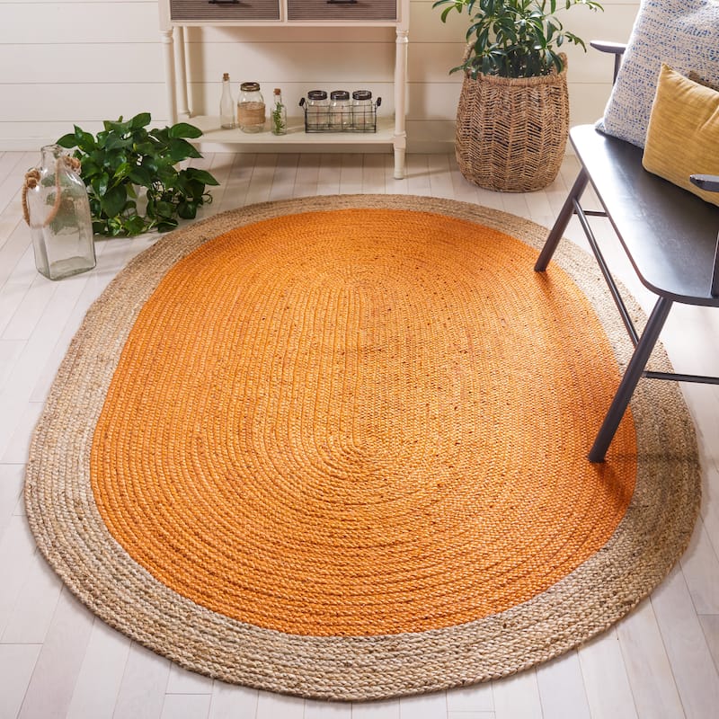 SAFAVIEH Handmade Natural Fiber Jolette Bordered Round Jute Rug - 5' x 8' Oval - Orange/Natural