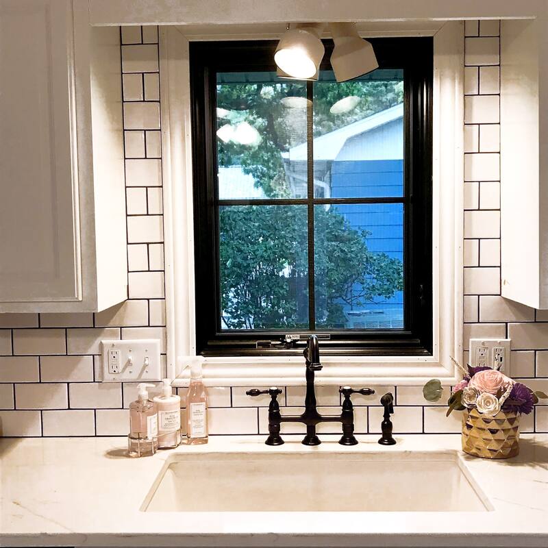 Kingston Brass Tudor Bridge Kitchen Faucet with Brass Sprayer