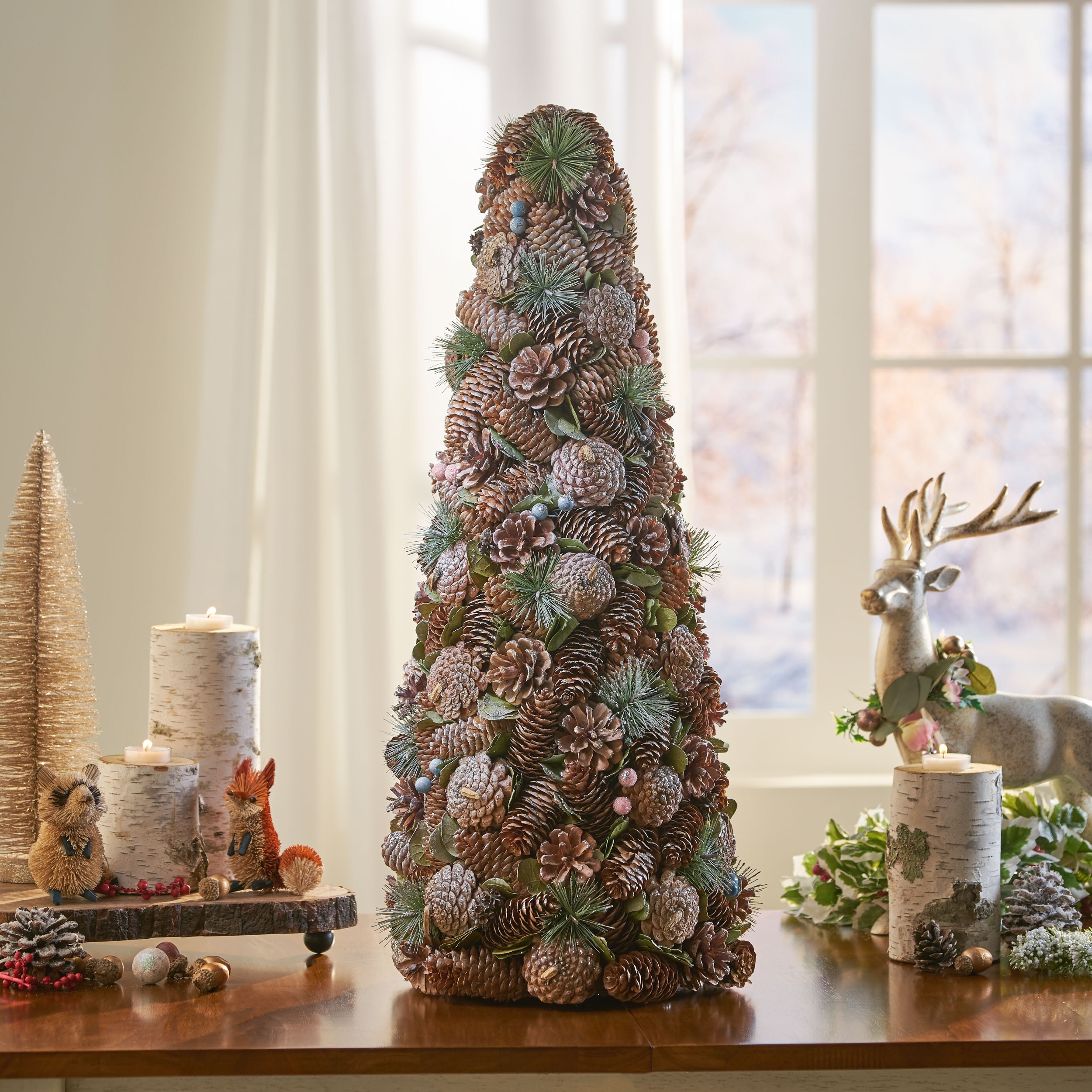 https://ak1.ostkcdn.com/images/products/is/images/direct/967cde431a06c62e051f3e96ccc2327dc29a9376/Walt-Pre-Decorated-Pine-Cone-and-Glitter-Artificial-Tabletop-Christmas-Tree-by-Christopher-Knight-Home.jpg