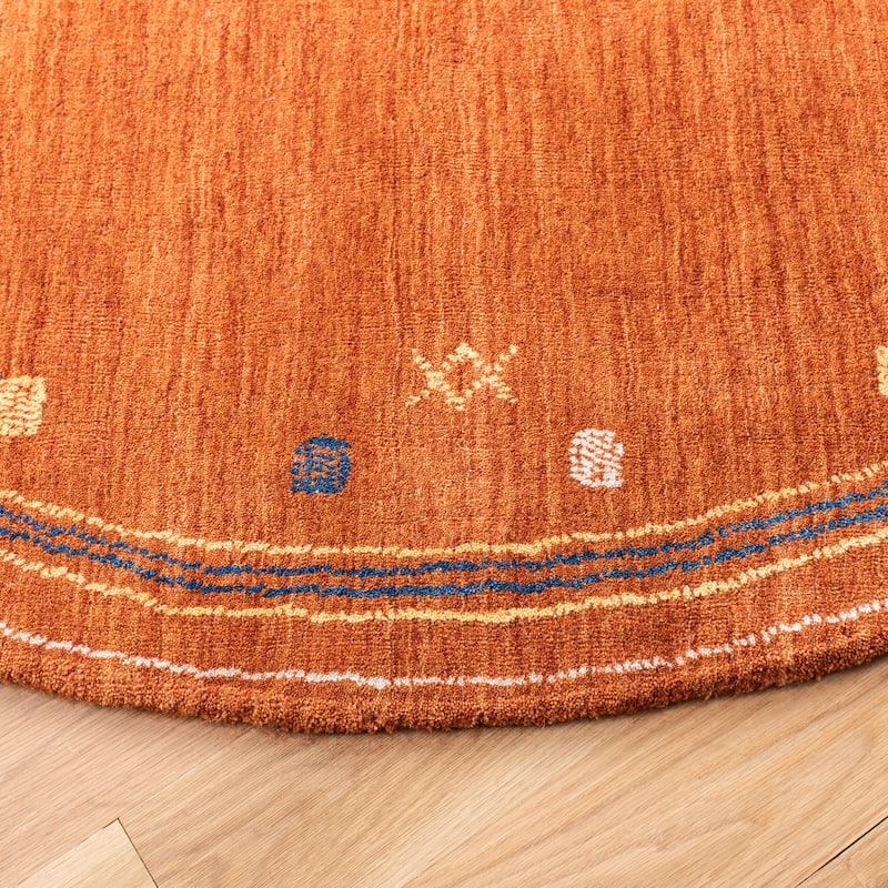 SAFAVIEH Handmade Himalaya Breann Border Wool Rug