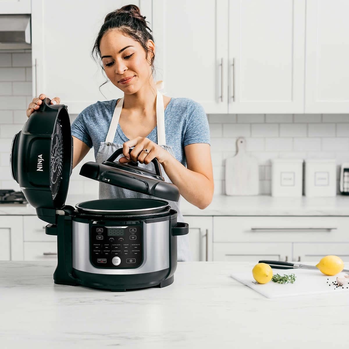 https://ak1.ostkcdn.com/images/products/is/images/direct/96842deed603ee466604e5e7e9fd6d3f857306fa/10-in-1-Pressure-Cooker-and-Air-Fryer-with-Nesting-Broil-Rack%2C-6.5-Quart-Stainless-Steel-Rice-Cooker.jpg