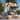 California Umbrella 8.5' Pagoda Series Patio Umbrella White Aluminum Pole Push Lift Sunbrella Natural and Pacific Blue