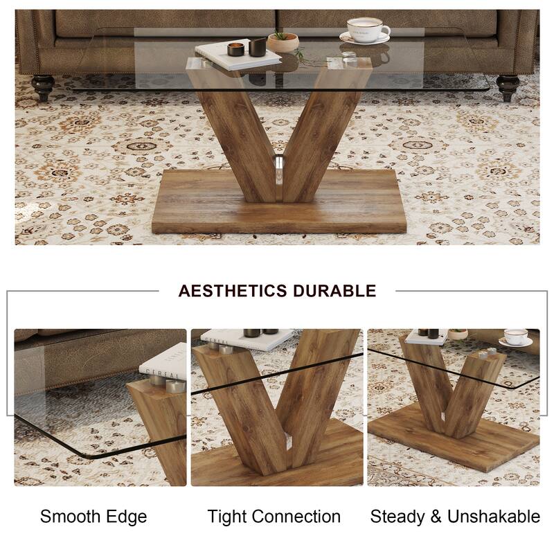 A modern minimalist style coffee table. Transparent tempered glass tabletop with wooden MDF columns