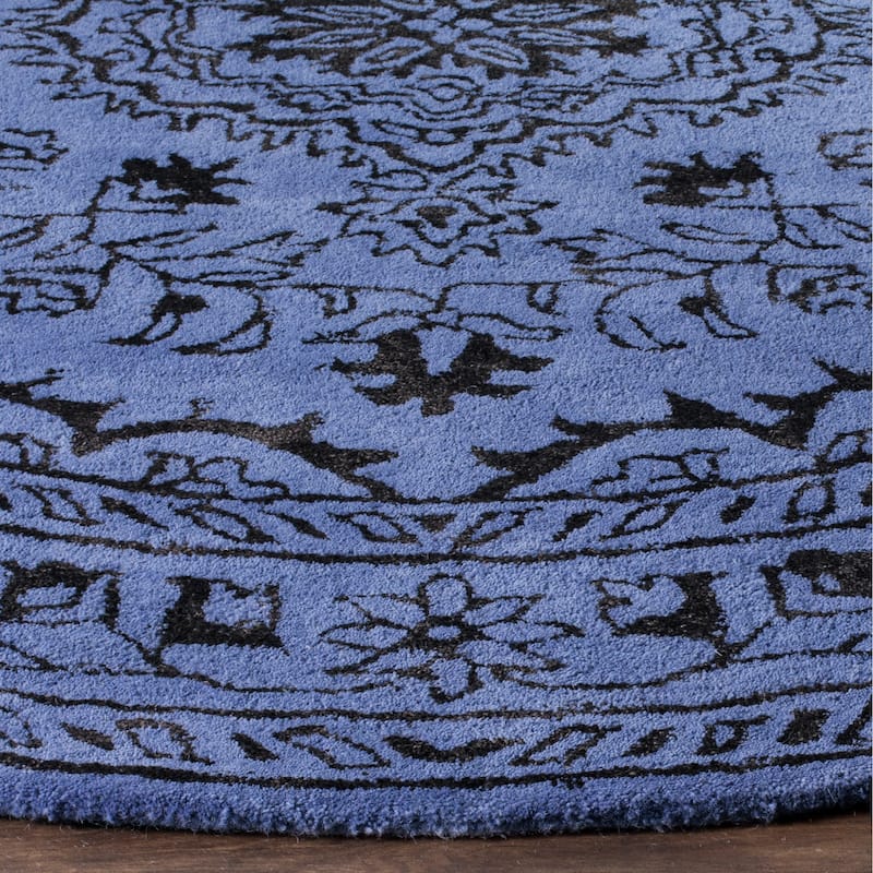 SAFAVIEH Handmade Glamour Gudmundina Modern Viscose Rug