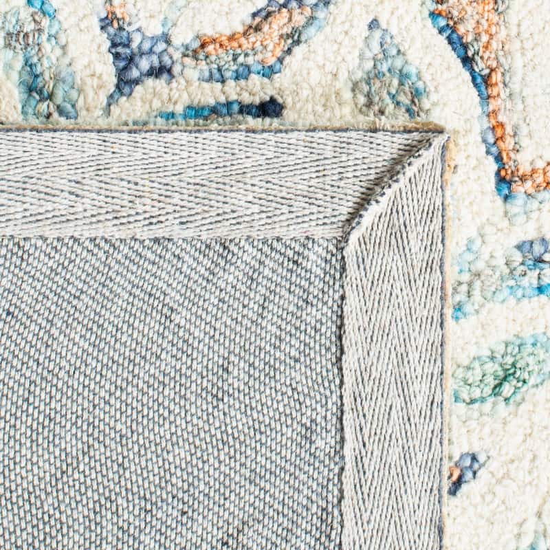 SAFAVIEH Handmade Capri Ilianka Wool Rug