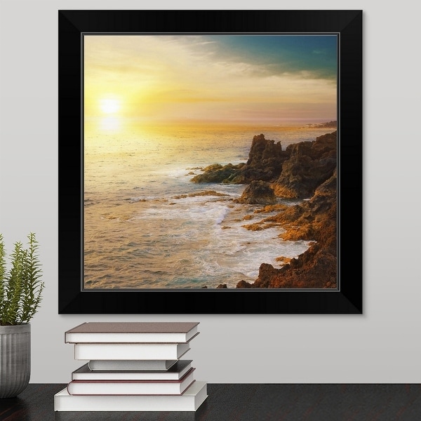 "Sunset on rocks." Black Framed Print