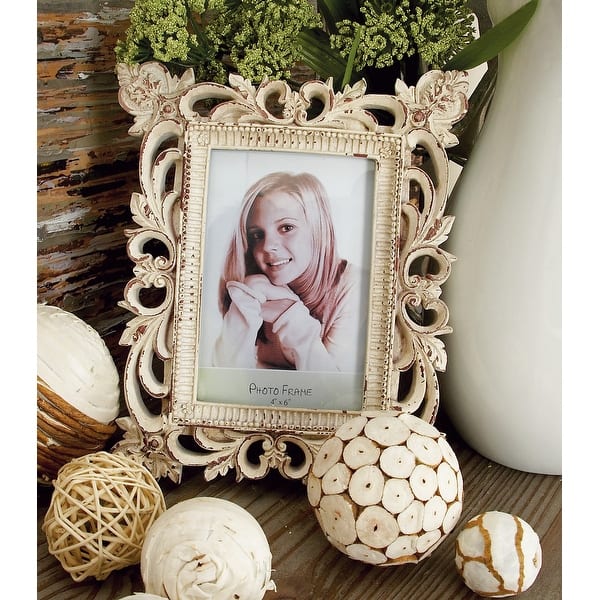 https://ak1.ostkcdn.com/images/products/is/images/direct/973e881cf67fbc5813b4f5a37eb762f1b826149b/Set-of-3-Polystone-Traditional-Photo-Frame%2C-11%22%2C-10%22%2C-9%22.jpg?impolicy=medium