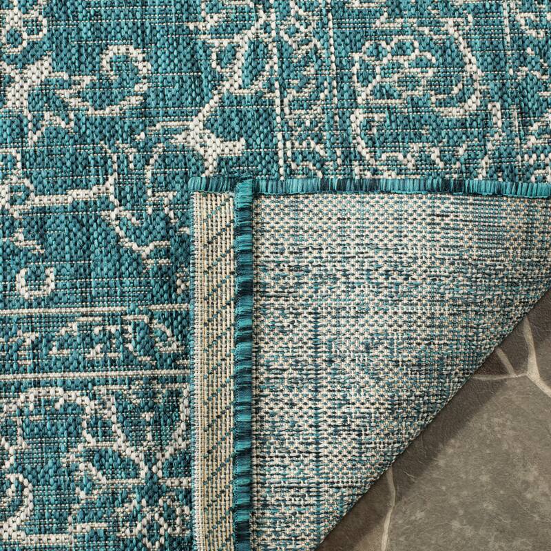 SAFAVIEH Courtyard Salomeea Indoor/ Outdoor Waterproof Turquoise Patio Backyard Rug