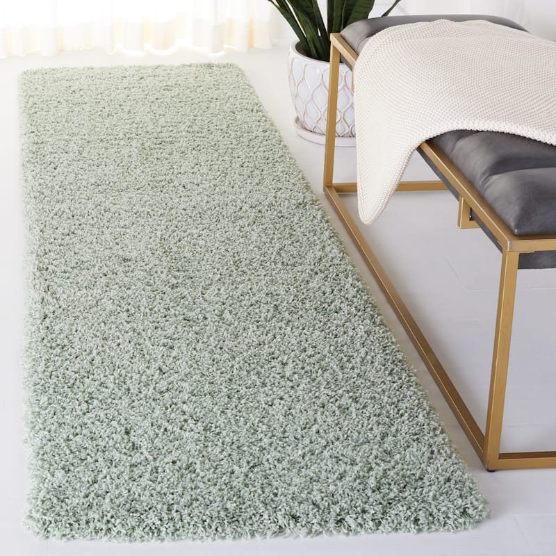 SAFAVIEH Laguna Shag Verdiana Solid Color 2-inch Thick Rug.