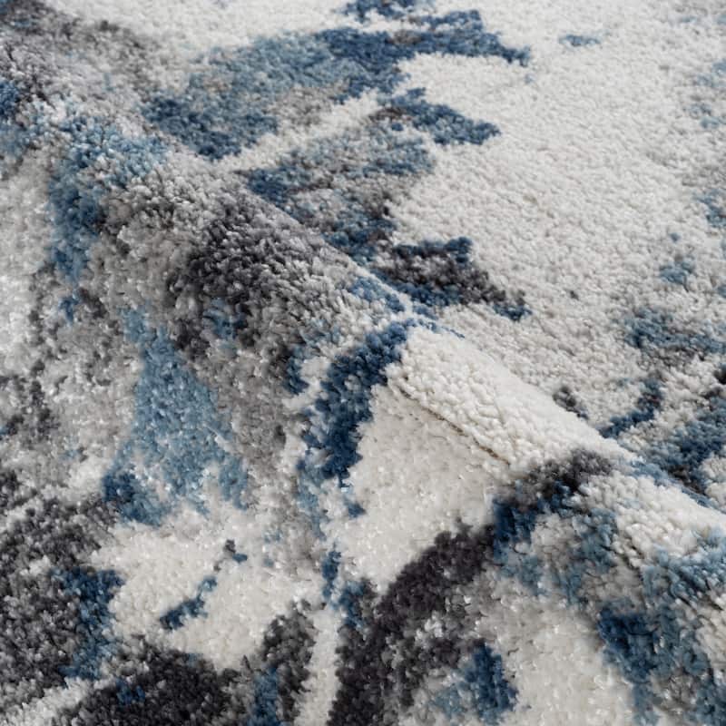 Avant Ivory and Blue Abstract Power-Loom Area Rug 2' x 3'