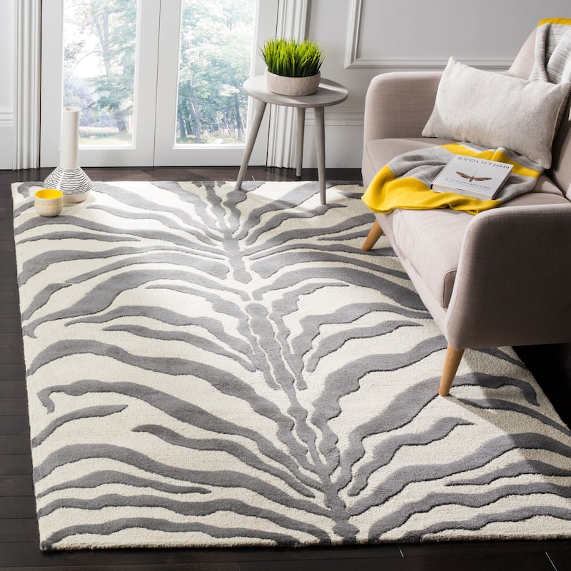 SAFAVIEH Handmade Cambridge Rikey Animal Print Wool Rug - 3' x 5' - Ivory/Dark Grey
