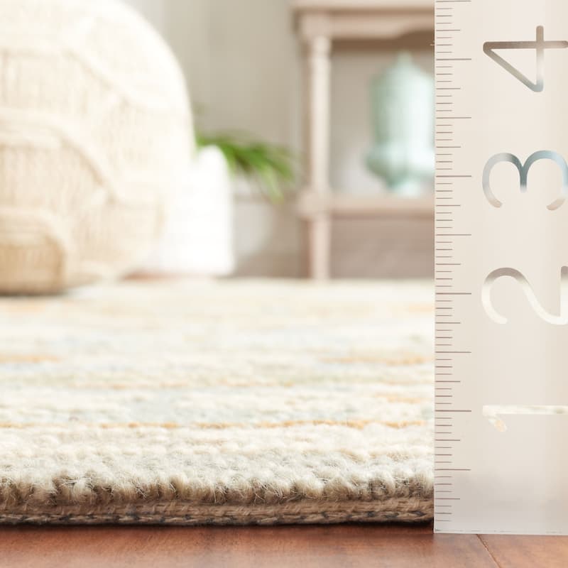 SAFAVIEH Handmade Heritage Stelia Traditional Wool Rug