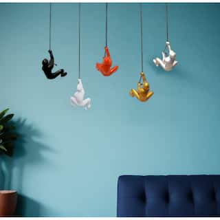 HomeRoots Set of Five Black Gold Orange Silver And White Resin Climbing Man Hanging Dimensional Sculpture
