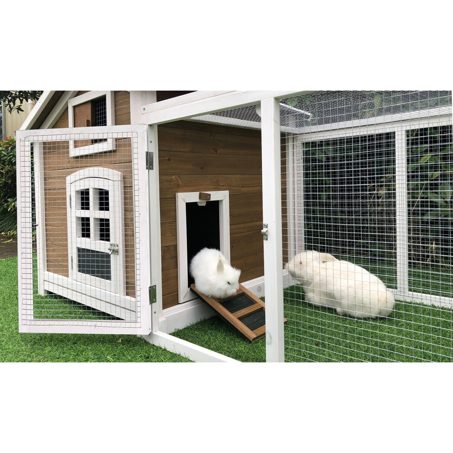 Hanover Outdoor Wooden Rabbit Hutch with Ramp Wire Mesh Run Waterproof Roof Removable Tray 5.1 ft. W x 2.8 D x 2.7 H Brown