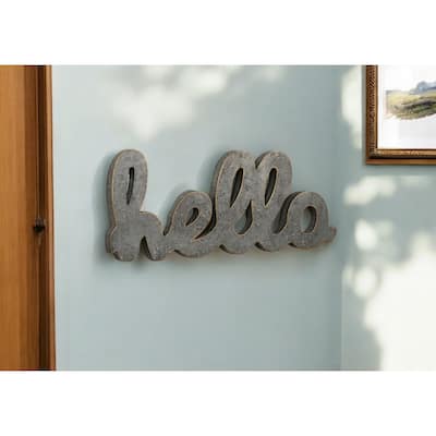 HomeRoots 12" X 28" Gray Handcrafted Abstract hello Metal Wall Decor