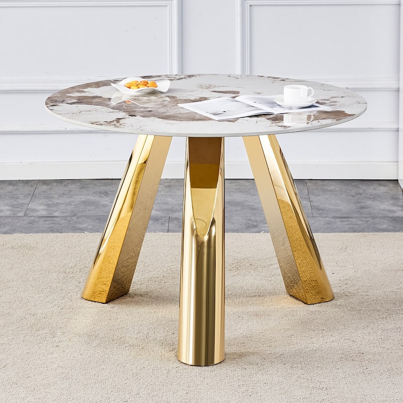 A 42-Inch Round Table with Stainless Steel Legs and a Marble Top, Perfect for 4 to 6 People.
