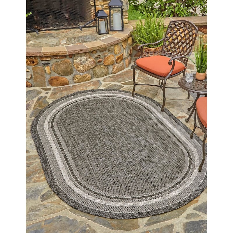 Outdoor Dimension Collection Area Rug - Black - 5'x8' Oval
