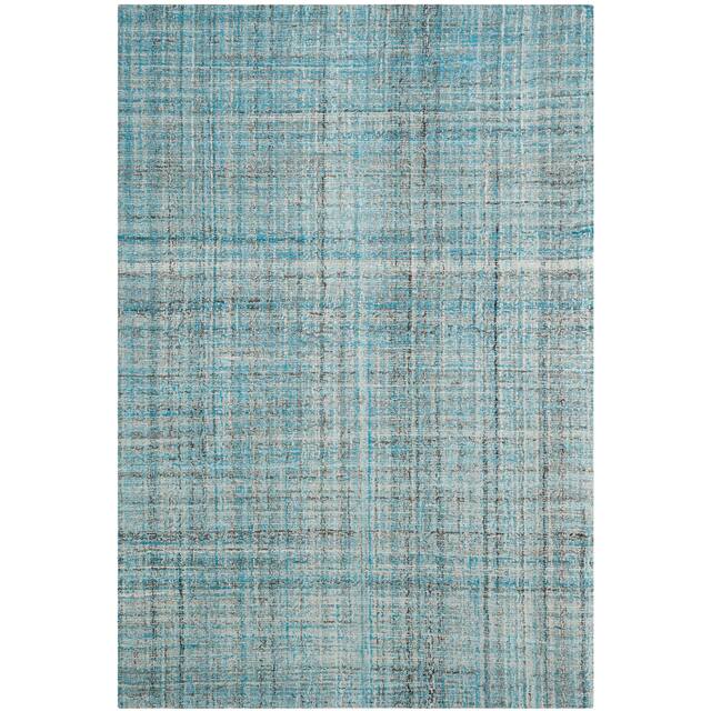 SAFAVIEH Handmade Abstract Nettie Modern Viscose Rug