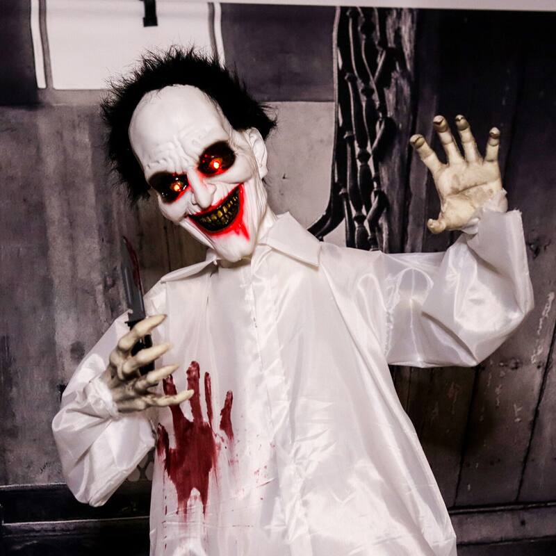 Haunted Hill Farm 5.75-Ft. Animatronic Doctor, Indoor/Covered Outdoor Halloween Decoration, Red LED Eyes, Laughing, Snips
