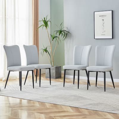 Modern minimalist dining chairs,PU curved backrest and seat cushions, metal chair legs, suitable for restaurants.set of 4