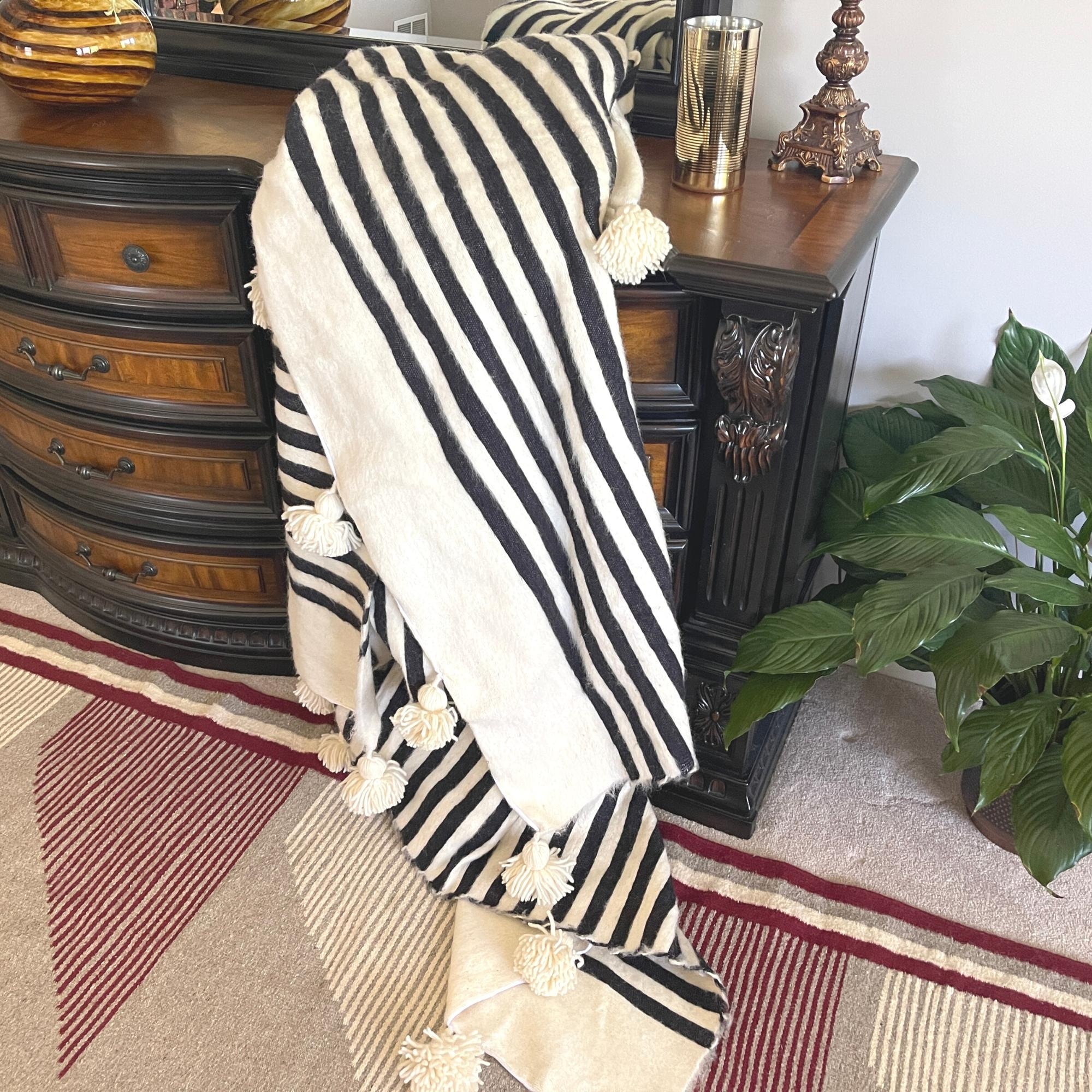 Striped pom pom blanket sales