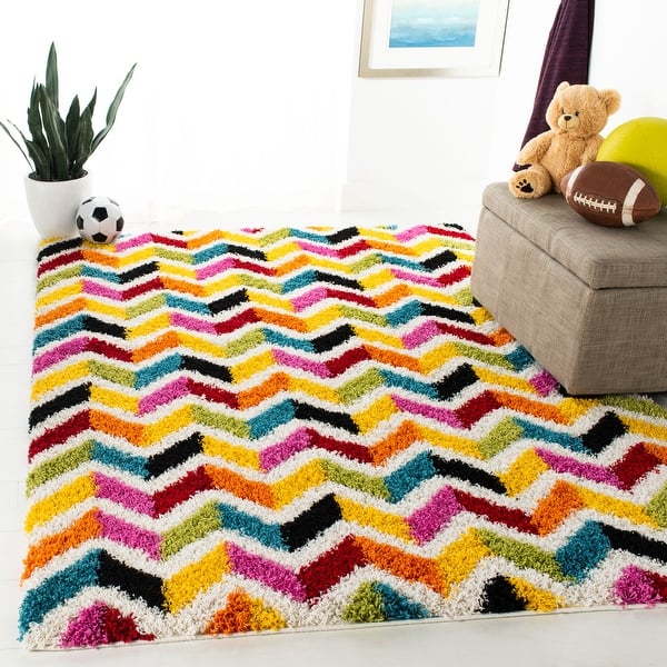 slide 2 of 13, SAFAVIEH Kids Veniamina Chevron Shag Area Rug 3' x 5' - Ivory/Multi