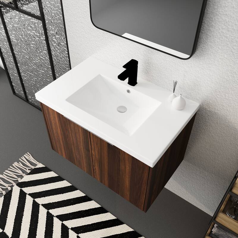 Modern Floating Bathroom Vanity with Single Resin Sink, Soft-Close Doors, Ample Storage, and Luxury Metal Handles