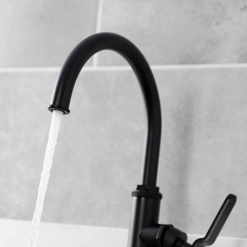 Kingston Brass Whitaker Single-Handle Deck Mount Kitchen Faucet with Brass Sprayer