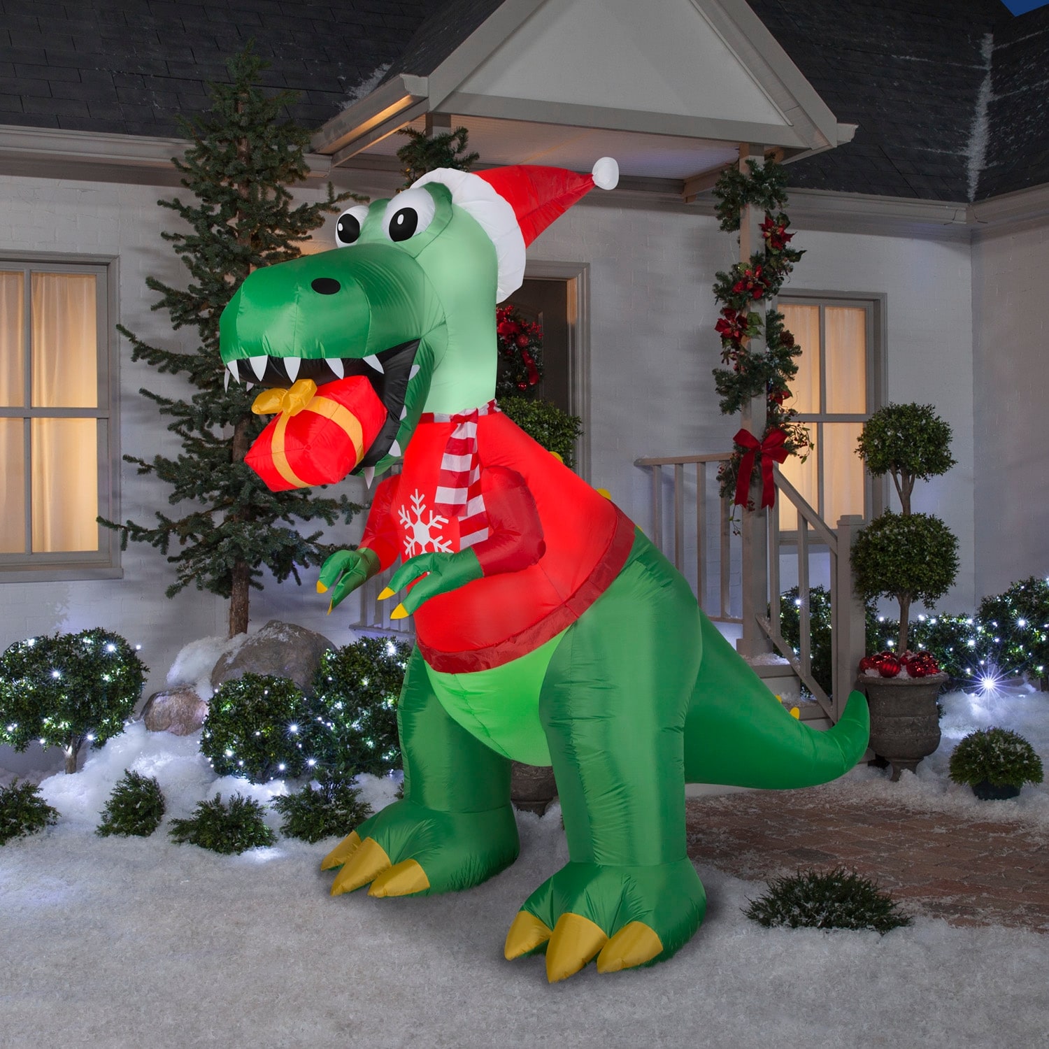 Gemmy Christmas Inflatable Dinosaur with Gift Box, 7.5 ft Tall