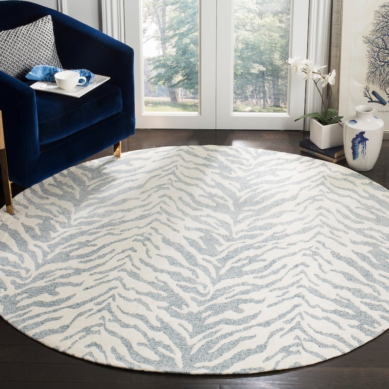 SAFAVIEH Handmade Flatweave Marbella Bogdana Modern Polyester Rug - 6' Round - Blue/Ivory