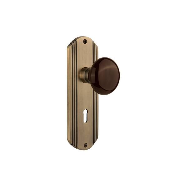 Classic Rosette 2-3/8 in. Backset Antique Brass Privacy Bed/Bath Deco Door Knob