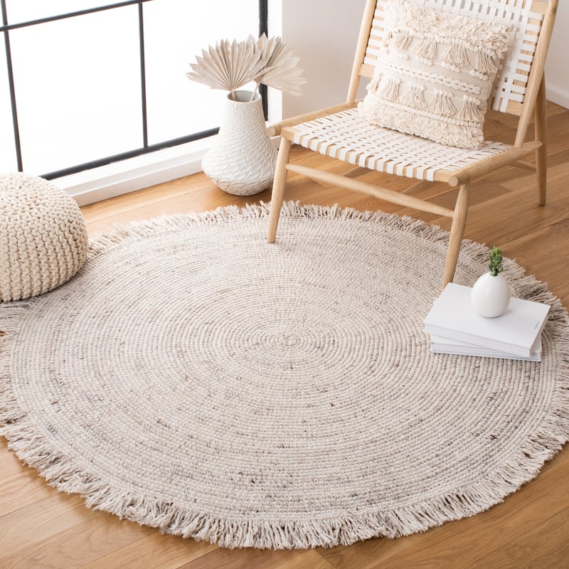 SAFAVIEH Handmade Braided Pelagia Fringe Round Rug - 6' Round - Beige