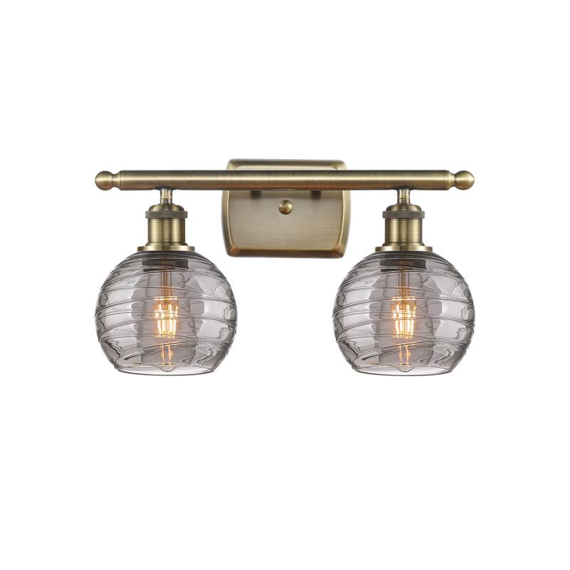 Innovations Lighting 516-2W-10-16 Athens Deco Swirl Vanity Athens Deco - Antique Brass / Light Smoke Deco Swirl