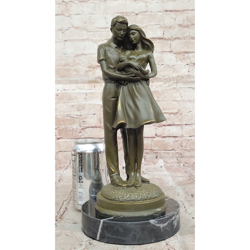 Bronze Sculpture Of Young Family Holding Newborn Baby By Milo