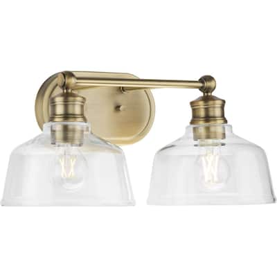 Singleton Collection 2-Light 17 in. Vintage Brass Vanity Light with Clear Glass Shades - Small