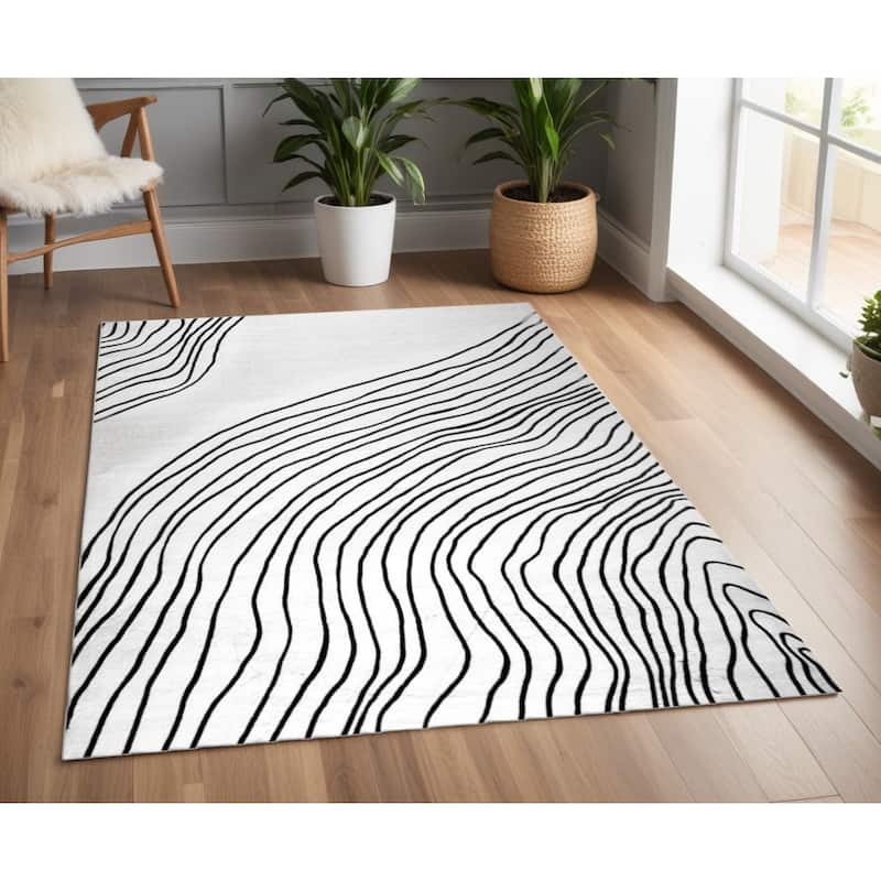 Qovo Abstract Modern Stain Resistant Woven Durable Area Rug By HomeRoots - 70' X '47' X '0.4 - 70' X '47' X '0.4 - Black and White - Rectangle