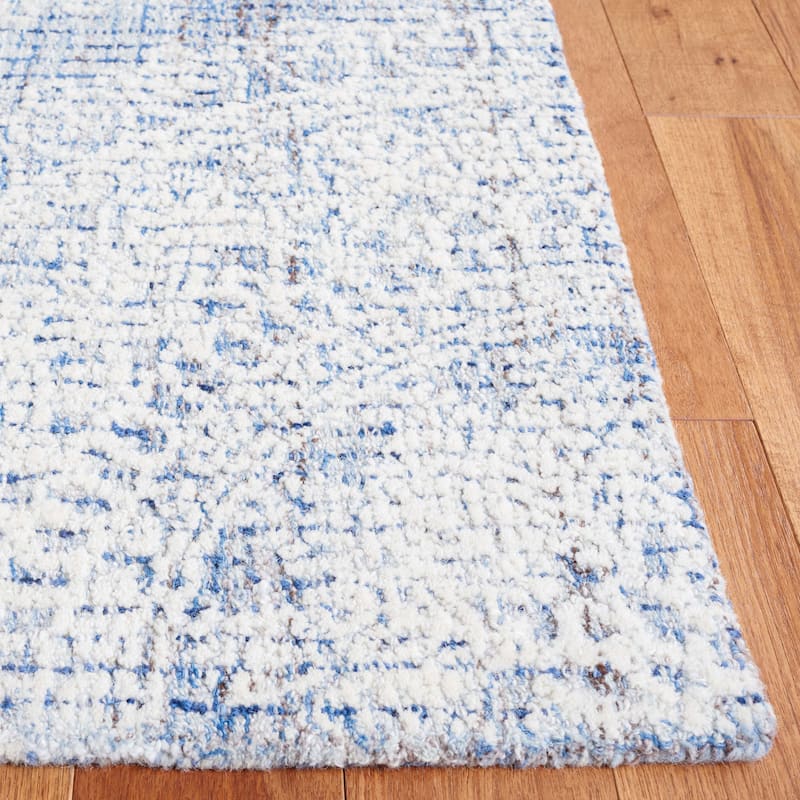 SAFAVIEH Handmade Ebony Satoko Medallion Wool Rug