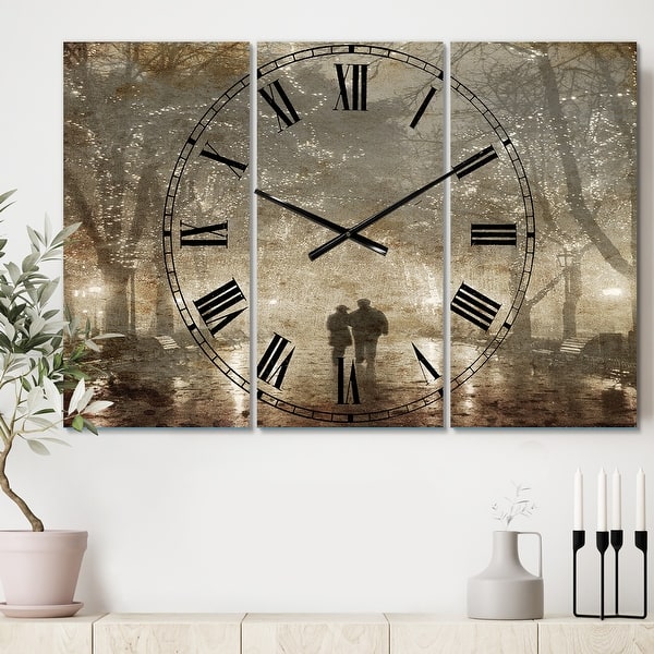 slide 2 of 6, Designart 'Couple Walking in Night Lights' Cottage 3 Panels Large Wall CLock - 36 in. wide x 28 in. high - 3 panels