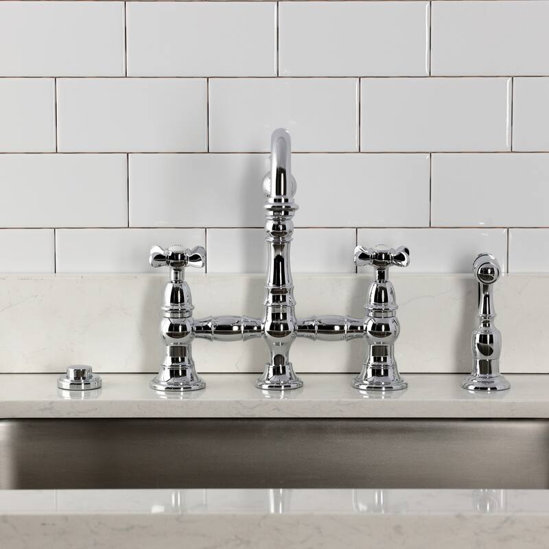 Kingston Brass Essex Two-Handle 4-Hole Deck Mount Bridge Kitchen Faucet with Brass Side Sprayer