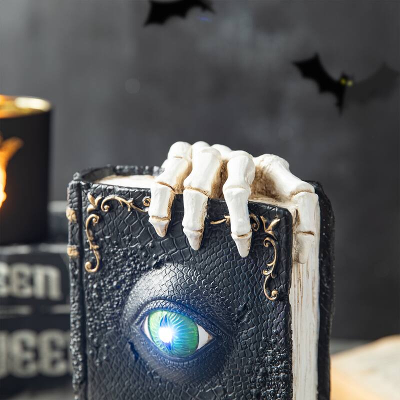 Glitzhome 7.75"H Halloween Lighted Ghostbuster Resin Book - Lighted Ghostbuster