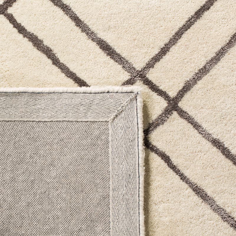 SAFAVIEH Handmade Himalaya Beadwork Modern Wool Rug